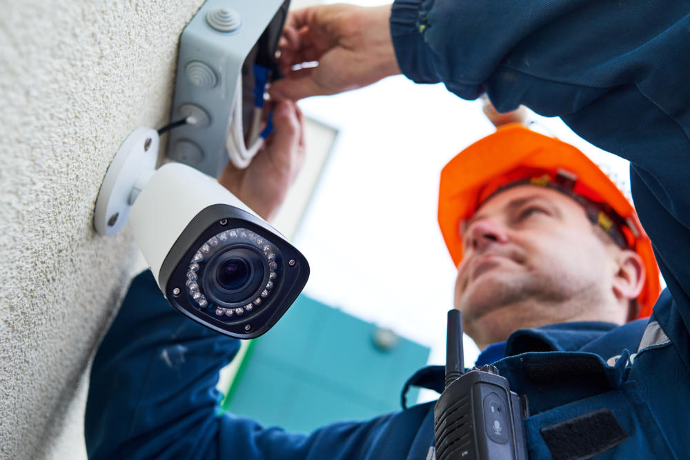 PSA Licensed Technician worker installing CCTV