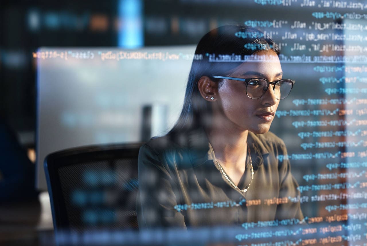 Who needs ISO 27701 - professional woman at a computer