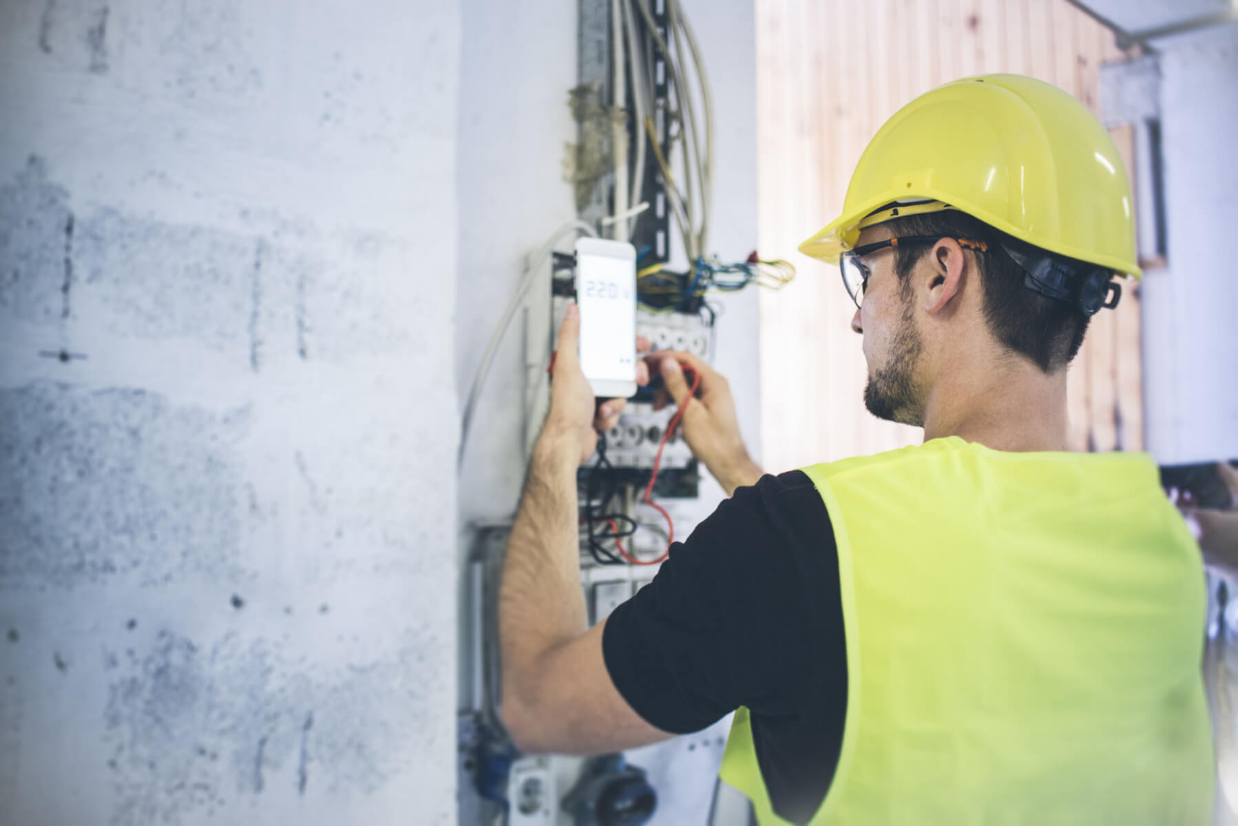 Man reviewing data on manufacturing site